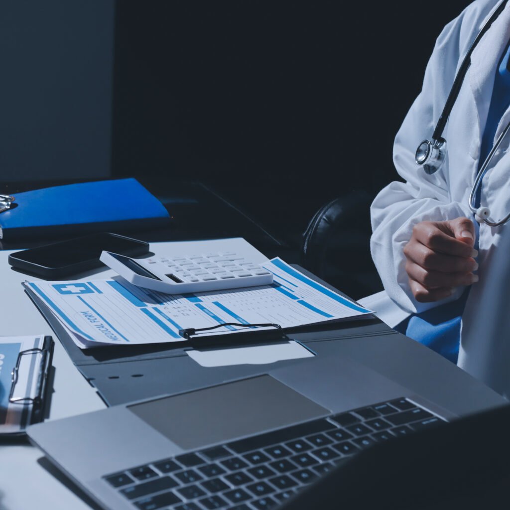 Medical billing company team working across shared screens