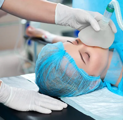 Anesthesia team monitoring a patient during surgery