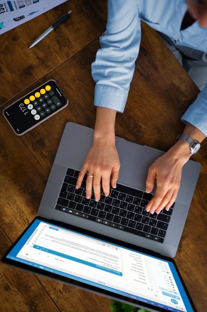 Practice manager reviewing gastroenterology revenue leakage on a laptop