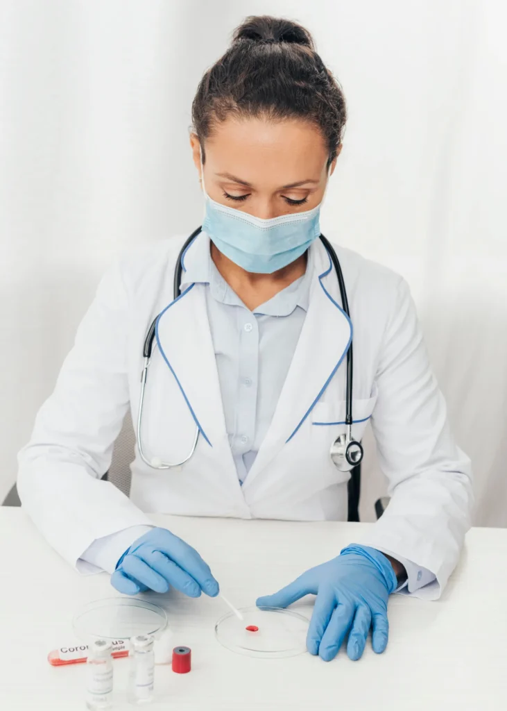 Laboratory technician handling drug testing samples