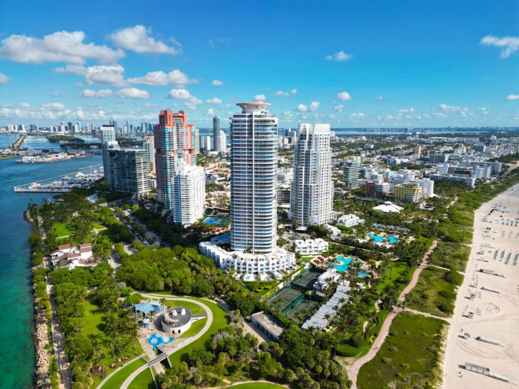 An aerial view of the Miami Beach coastline and high-rise skyline