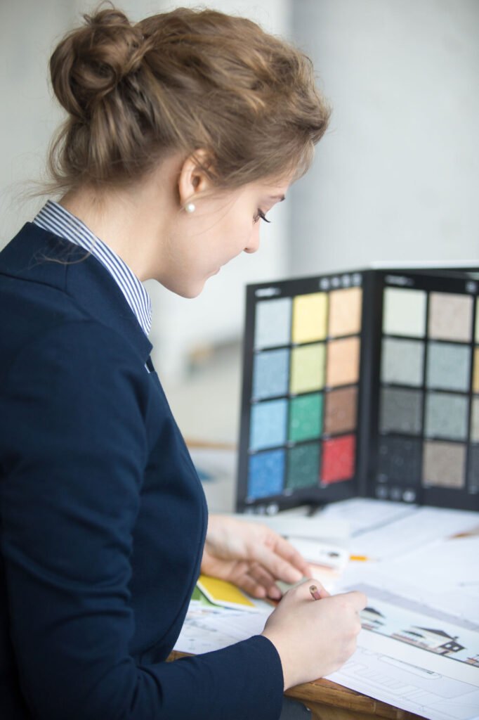 A billing specialist reviewing a colour-coded document