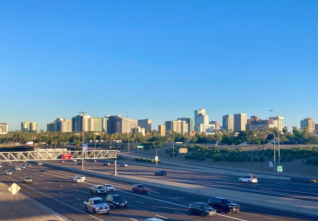 The downtown Phoenix skyline above the freeway on a clear morning