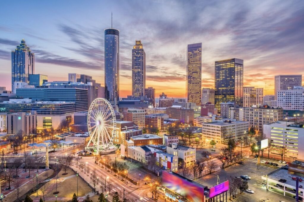 The downtown Atlanta skyline and SkyView Ferris wheel at dusk